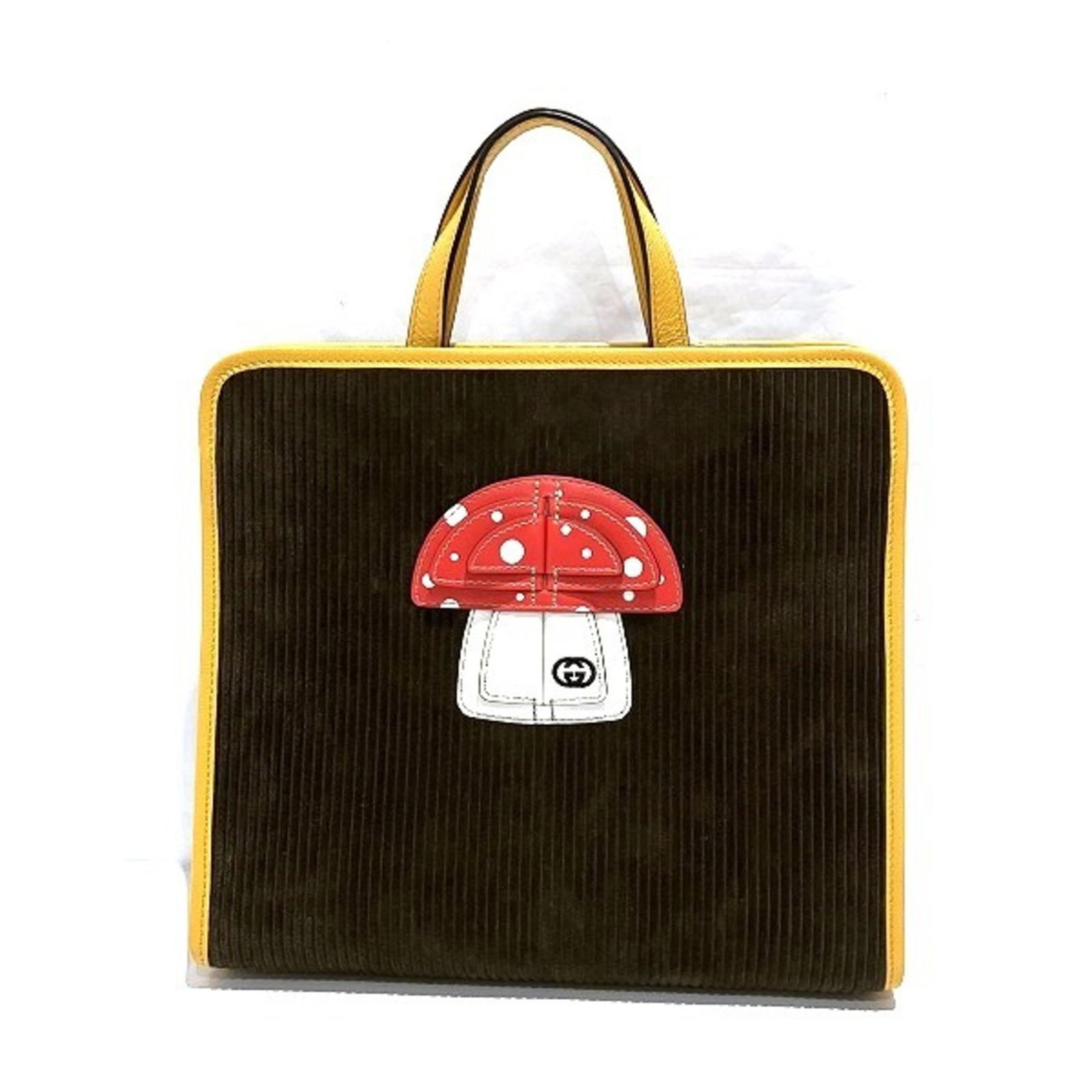 Gucci Mushroom Tote Handbag in Brown Yellow Cord Leather for Women: Gucci Mushroom Tote Handbag in Brown Yellow Cord Leather for Women This stunning handbag from Gucci is crafted from cord leather in a rich brown yellow color. Designed for women, it features a spaciou