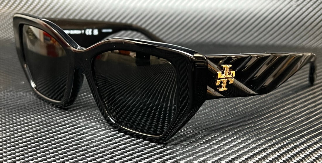Tory Burch Women's Oversized Sunglasses in Shiny Black: Tory Burch Women's Oversized Sunglasses in Shiny Black These Tory Burch women's sunglasses feature a shiny black frame. The sunglasses are designed with a 53 mm lens width, offering a fashionable and