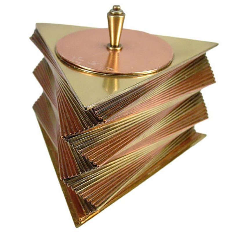 Art Deco Stacked Brass and Copper Box Set by John Otar: Art Deco Stacked Brass and Copper Box Set by John Otar This stunning Art Deco stacked brass and copper box set, crafted by renowned maker John Otar, features a sleek design typical of the 1930s. Made