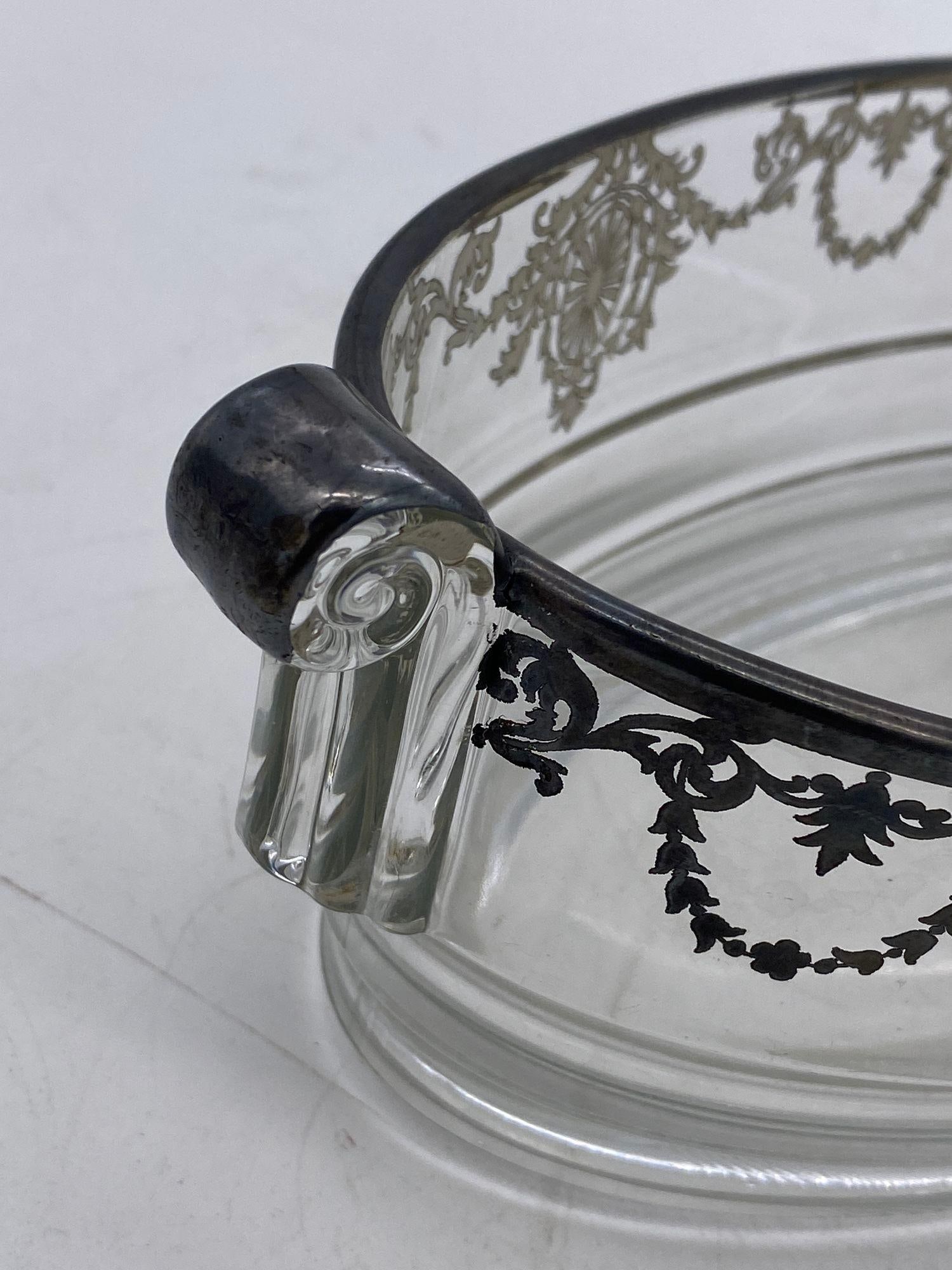 Art Deco Silver Overlay Glass Serving Bowl 12 inches: Art Deco Silver Overlay Glass Serving Bowl 12 inches This exquisite Art Deco serving bowl features a stunning silver overlay on glass, showcasing elegant scrolling handles. Measuring 3.5 inches in hei