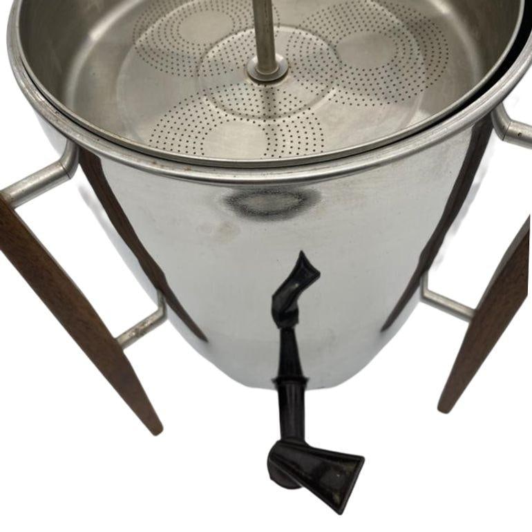 Mid Century Chrome Teak Coffee Maker by Regal 16.25in Height 11in Width 11in Depth: Mid Century Chrome Teak Coffee Maker by Regal 16.25in Height 11in Width 11in Depth This Mid Century Chrome and Teak Coffee Maker by Regal features a striking design and is a perfect addition to any vi