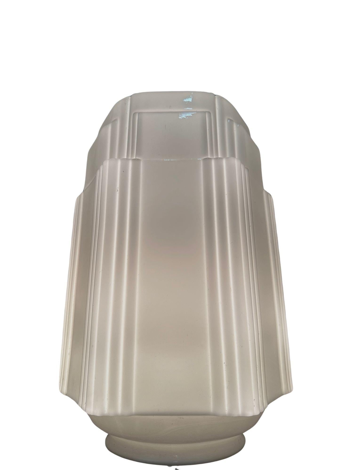 Art Deco Chrome Ceiling Pendant Light Set of Four 33in Globe: Art Deco Chrome Ceiling Pendant Light Set of Four 33in Globe This stunning set of four Art Deco ceiling pendants features tall stepped globes made of glass. Each pendant measures 33 inches in height,