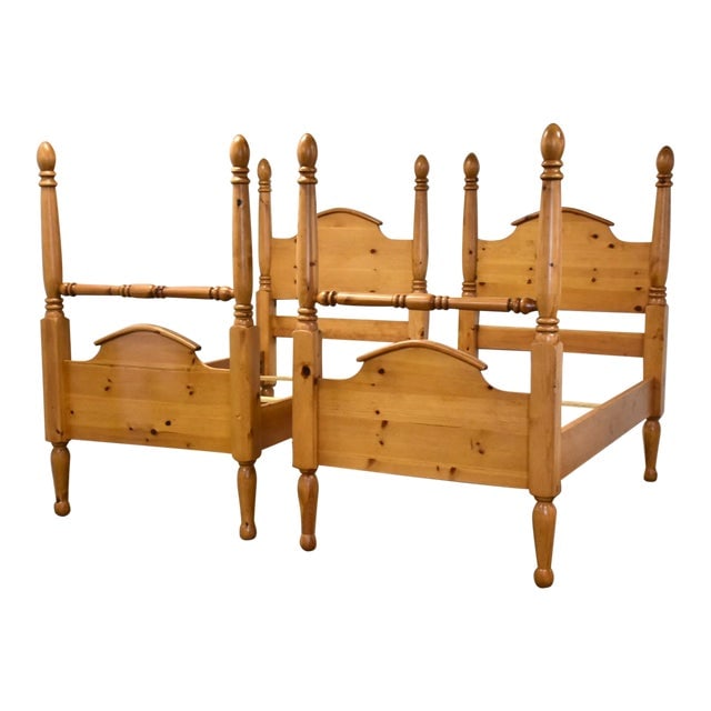 1970s Country Pine Twin Beds Pair: 1970s Country Pine Twin Beds Pair A vintage pair of country pine four poster twin beds from the 1970s. Each bed features a sturdy construction with a clearance under the side rails of 15.5 inches. The
