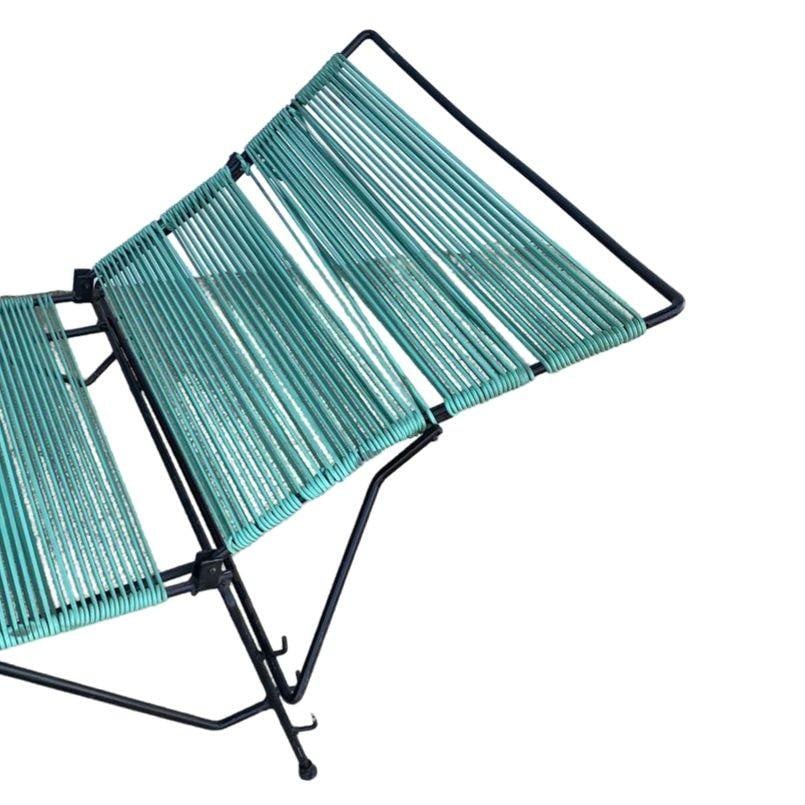 Mid Century Iron Outdoor Chaise Lounge with Teal Cord: Mid Century Iron Outdoor Chaise Lounge with Teal Cord This Mid Century Iron Outdoor Chaise Lounge by Woodard Furniture Co. showcases a stylish design from the 1960s. Crafted from durable iron, it feat