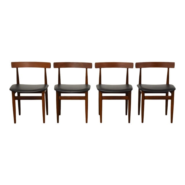 Hans Olsen Walnut Dining Chairs Set of 4 Mid Century Modern: Hans Olsen Walnut Dining Chairs Set of 4 Mid Century Modern This set of four mid-century modern dining chairs, designed by Hans Olsen for Frem Rojle, features a stylish walnut construction. Each chair