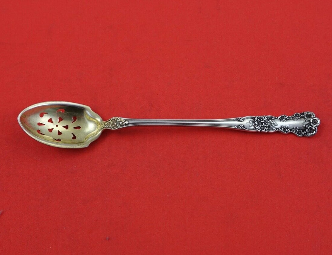 Gorham Buttercup Sterling Silver Olive Spoon 5 Inches Pierced Gold Washed: Gorham Buttercup Sterling Silver Olive Spoon 5 Inches Pierced Gold Washed This Buttercup by Gorham Sterling Silver Olive Spoon features an intricately carved floral motif along the handle and neck, ba