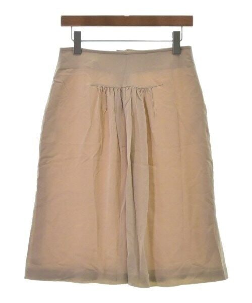 Rochas Beige Knee-length Skirt Size 42: Rochas Beige Knee-length Skirt Size 42 This knee-length skirt by Rochas is crafted in a beige color and designed for women. It features a pleated front design, providing a stylish touch. Size 42 corre