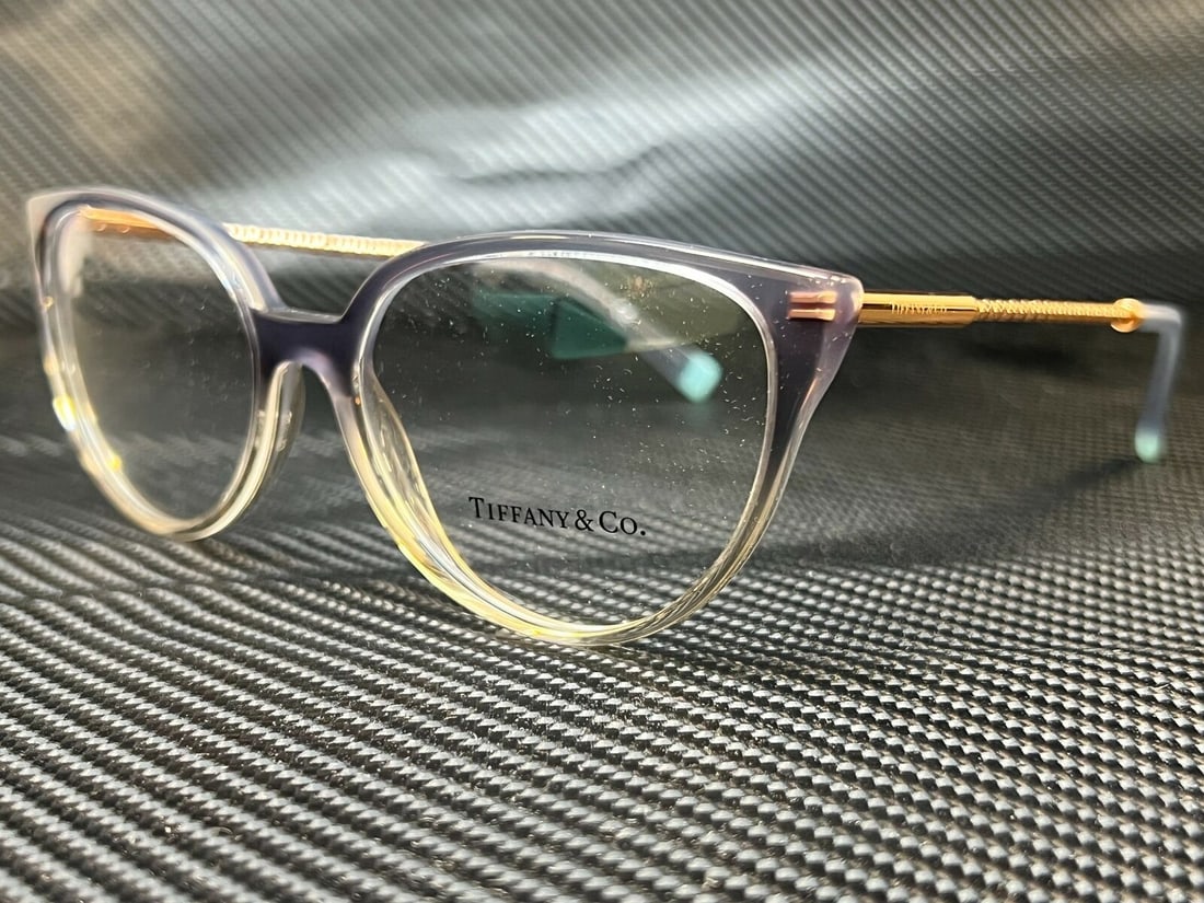 Tiffany TF2206 8298 Grey Blue Oval Women's Eyeglasses 55 mm: Tiffany TF2206 8298 Grey Blue Oval Women's Eyeglasses 55 mm Stylish Tiffany TF2206 8298 eyeglasses in a grey blue color. Designed with an oval frame, these eyeglasses are perfect for women's fashion.