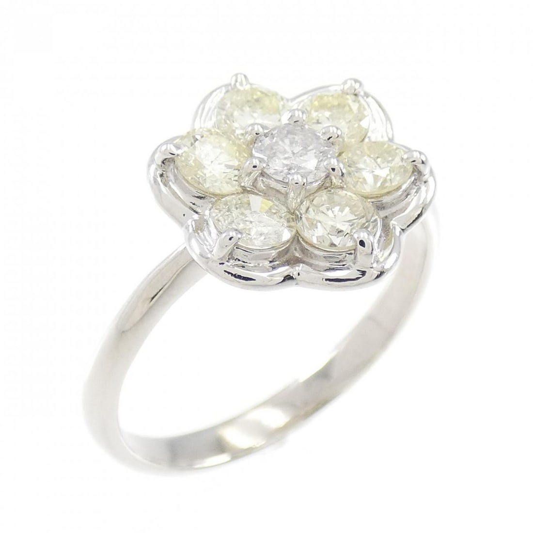 Ladies Platinum Flower Ring with 1.00CT Diamond Size 6.5: Ladies Platinum Flower Ring with 1.00CT Diamond Size 6.5 This exquisite PT Flower Diamond Ring features a stunning 1.00CT diamond, elegantly set in platinum. Designed for ladies, this ring is a size 6