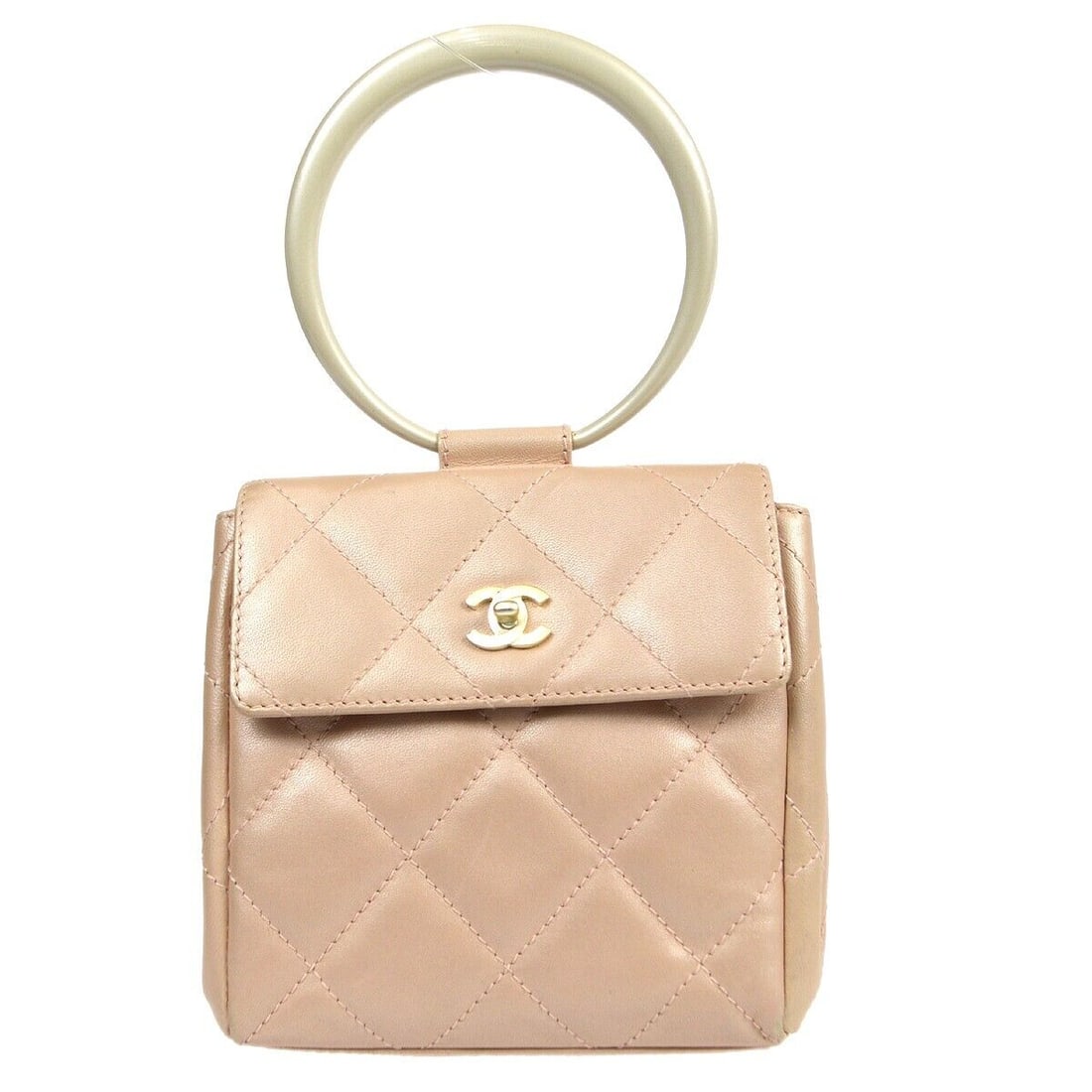 Chanel Mini Quilted Top Handle Handbag in Pink Lambskin with Golden Hardware: Chanel Mini Quilted Top Handle Handbag in Pink Lambskin with Golden Hardware This exquisite Chanel Mini Quilted Top Handle Handbag is crafted from soft pink lambskin leather, featuring a classic matel