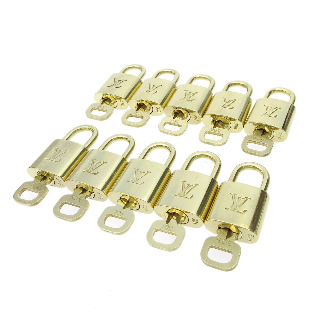 Louis Vuitton Gold Padlock and Key Bag Accessories Charm Set of Ten: Louis Vuitton Gold Padlock and Key Bag Accessories Charm Set of Ten This set includes ten gold padlocks featuring the iconic Louis Vuitton logo. The outside condition is rated as AB: Very Good, while 