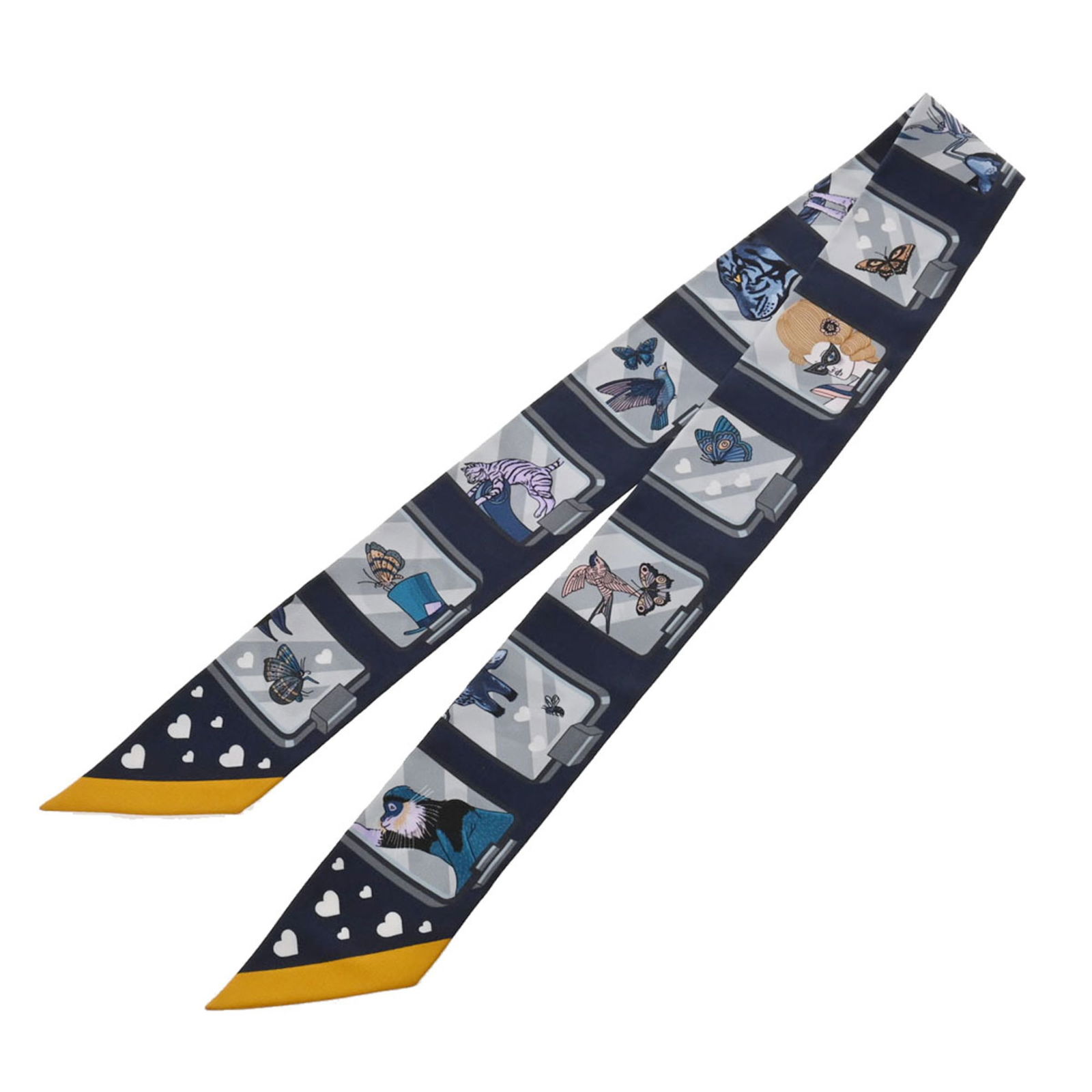 Hermes Twilly Silk Scarf Muffler Navy Light Blue 100% Silk 85cm x 5cm: Hermes Twilly Silk Scarf Muffler Navy Light Blue 100% Silk 85cm x 5cm This Hermes Twilly scarf features a charming navy and light blue color scheme. Made from 100% silk, it measures 85cm x 5cm (approx