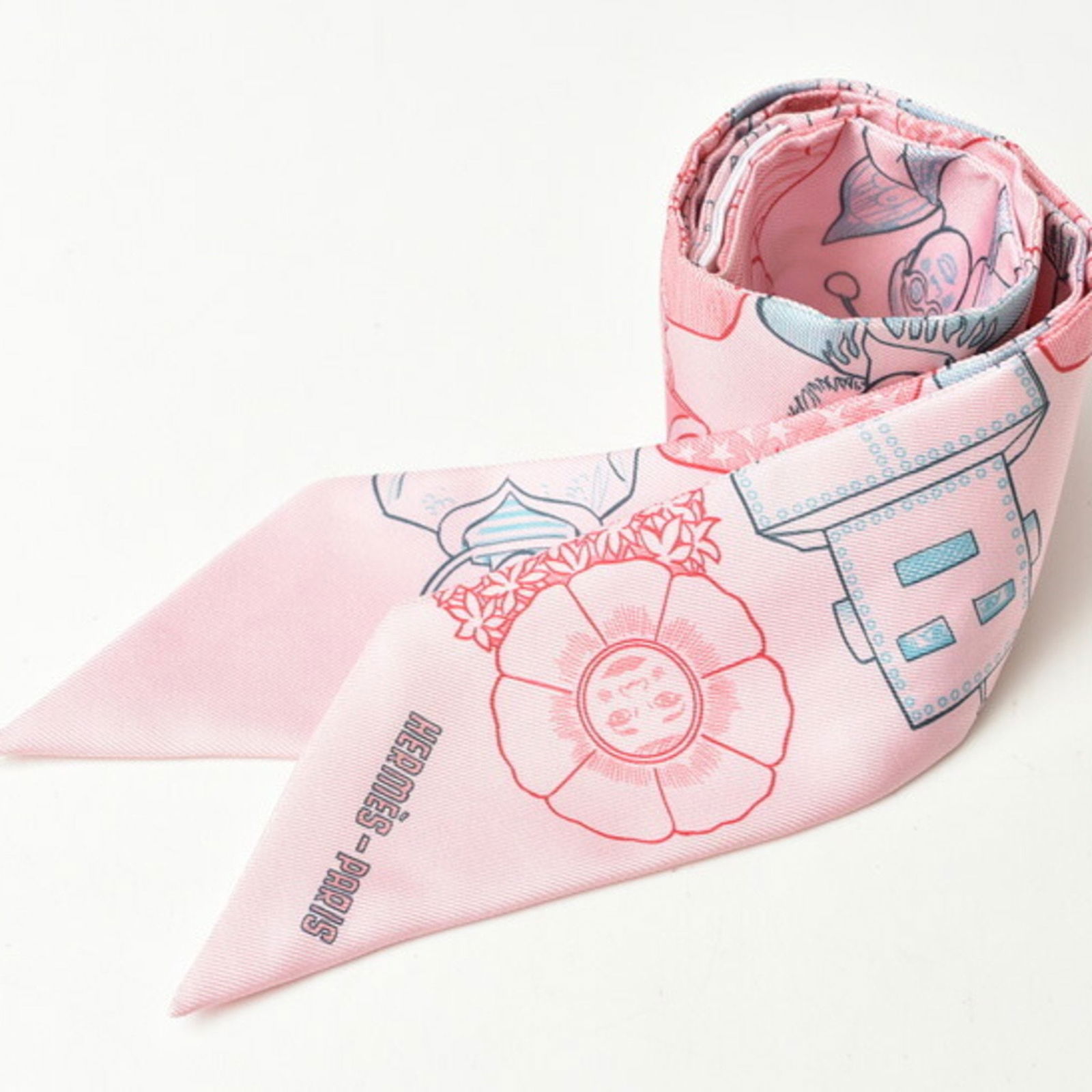 Hermes Pink Silk Twilly Scarf for Women: Hermes Pink Silk Twilly Scarf for Women Elegant Hermes Twilly scarf made of premium silk in a beautiful pink color. This versatile accessory measures 85cm in length and 5cm in width, perfect for vario