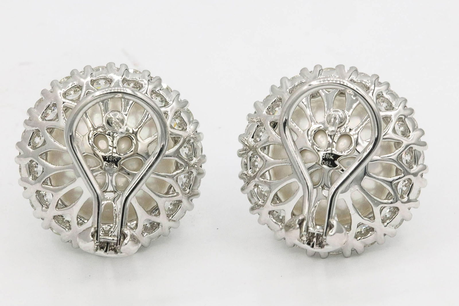 Contemporary South Sea Pearl Diamond Halo Stud Earrings 2.75 Carats 18K Gold: Contemporary South Sea Pearl Diamond Halo Stud Earrings 2.75 Carats 18K Gold These exquisite contemporary stud earrings feature a stunning South Sea pearl surrounded by a halo of diamonds. Crafted fro