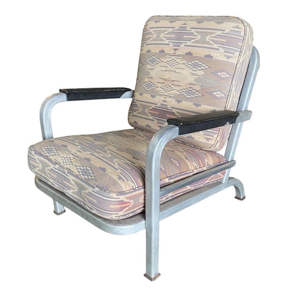 1930s Streamline Aluminum Lounge Chair with New Cushions: 1930s Streamline Aluminum Lounge Chair with New Cushions This 1930s Machine Age Streamline Aluminum Tubular Lounge Club Chair features a sleek design characteristic of the era. The chair is constructe
