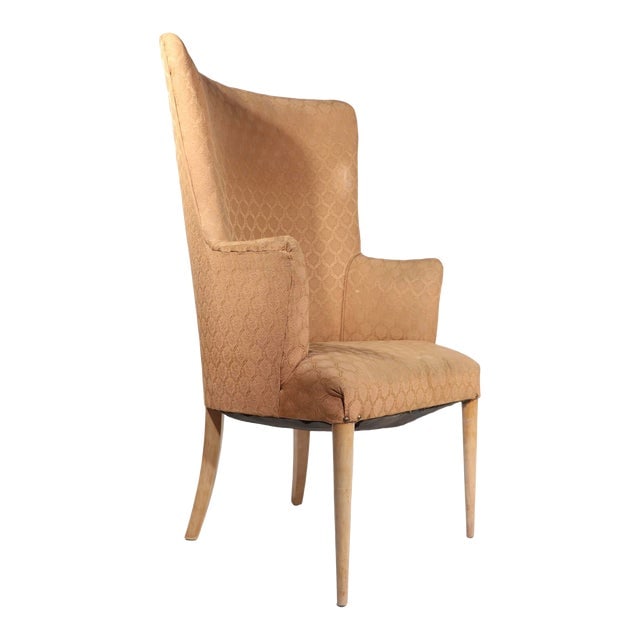 Dramatic High Back Mid Century Upholstered Chair: Dramatic High Back Mid Century Upholstered Chair Dramatic and elegant high back lounge chair circa 1930/1950's having tapered pole front legs and squared tapering rear legs which support the upholster