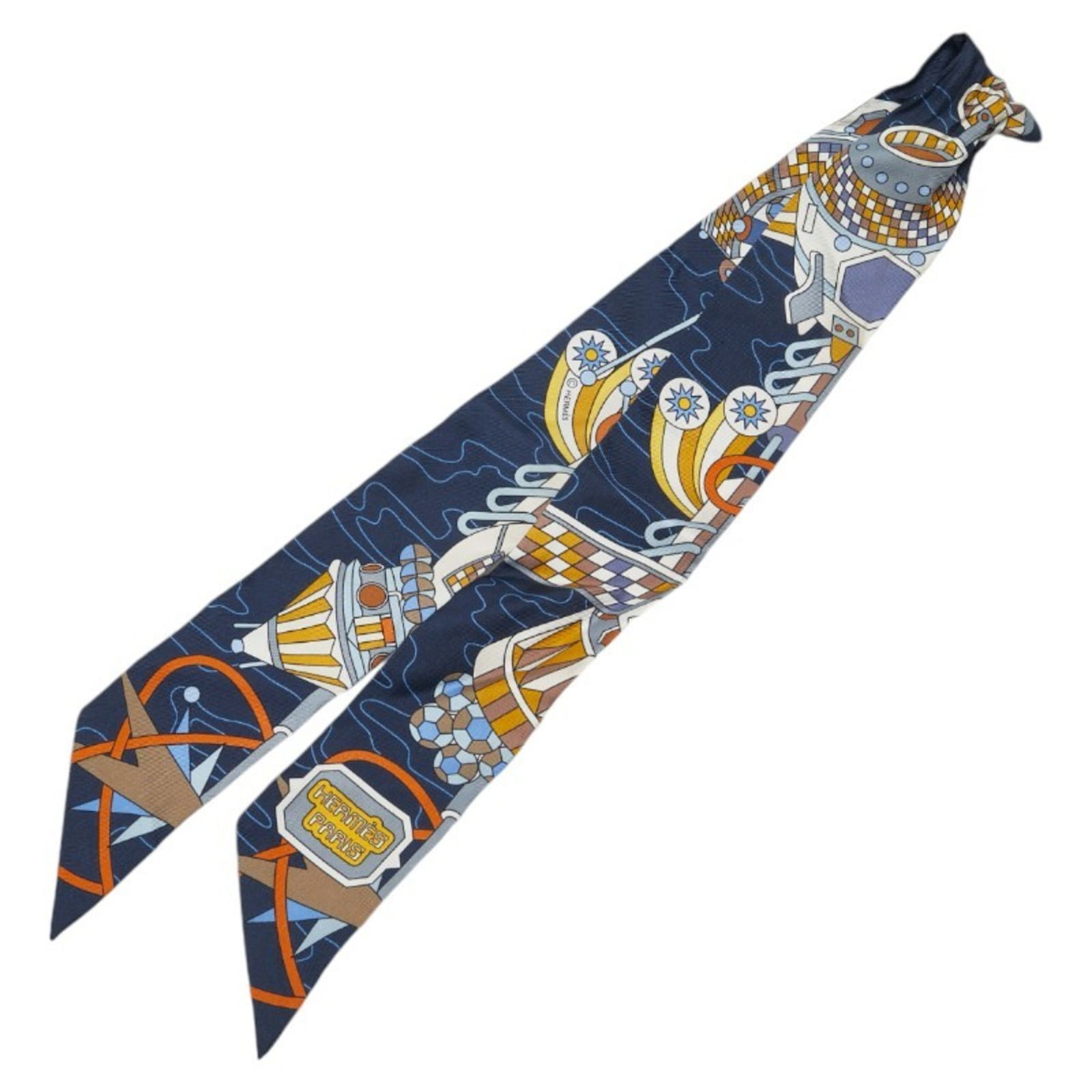 Hermes Twilly Odyssey Scarf in Navy Multicolor Silk for Women: Hermes Twilly Odyssey Scarf in Navy Multicolor Silk for Women This elegant Hermes Twilly Odyssey scarf is a stunning accessory crafted from high-quality silk, featuring a beautiful multi-color navy de