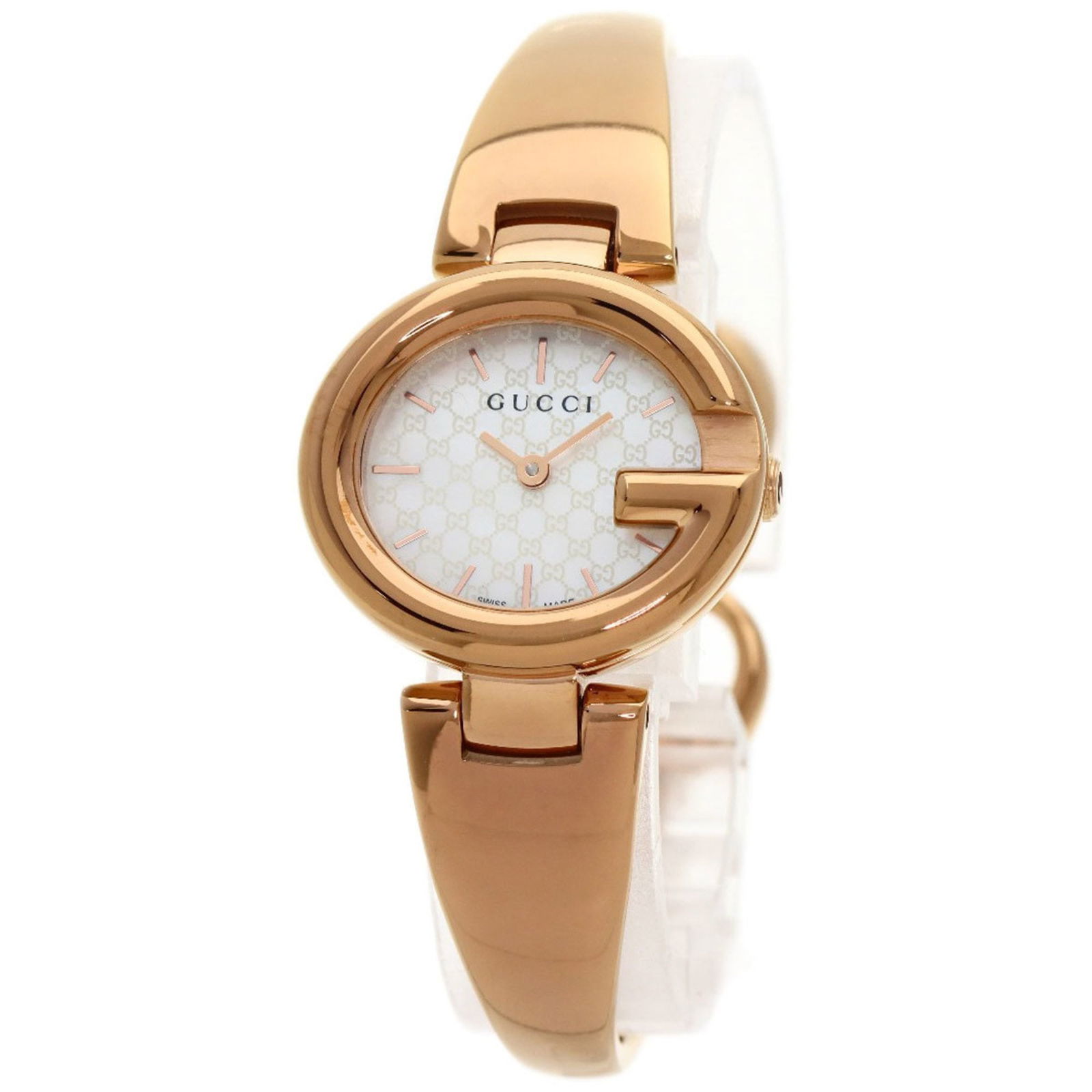 Gucci Ladies 134.5 GG Shell Watch in Pink Gold Plated with White Dial: Gucci Ladies 134.5 GG Shell Watch in Pink Gold Plated with White Dial This elegant Gucci wristwatch is designed for women, featuring a pink gold plated case and band. The watch has a striking white sh