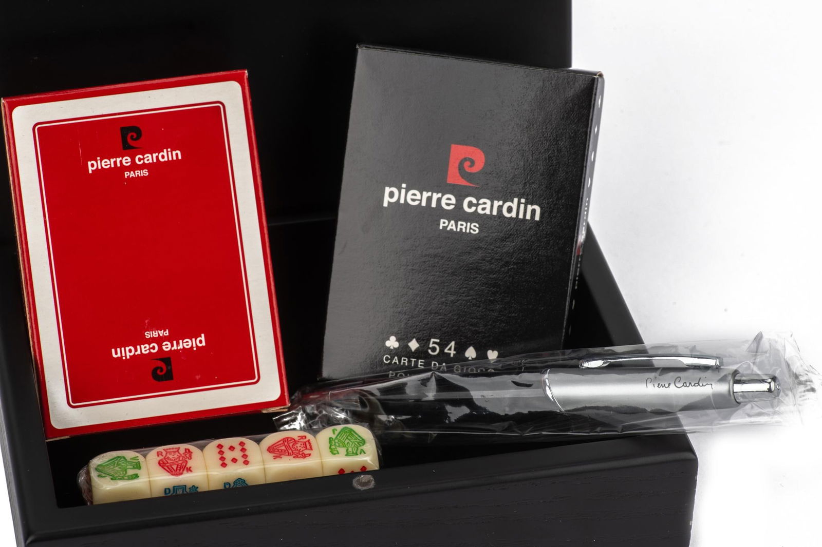 Pierre Cardin Poker Card Set with Wooden Box, 21st Century: Pierre Cardin Poker Card Set with Wooden Box, 21st Century This is a Pierre Cardin set of poker cards featuring two decks housed in a sleek black wooden box. Ideal for game nights or collectors, the d