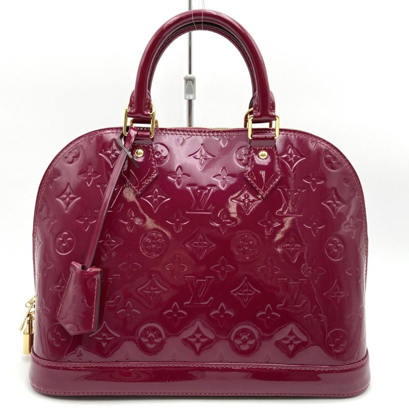 Louis Vuitton Alma PM Handbag Wine Monogram Vernis for Women 23cm x 31cm x 15cm: Louis Vuitton Alma PM Handbag Wine Monogram Vernis for Women 23cm x 31cm x 15cm A stylish Louis Vuitton Alma PM handbag made from Monogram Vernis material in a rich wine color. This handbag is designe