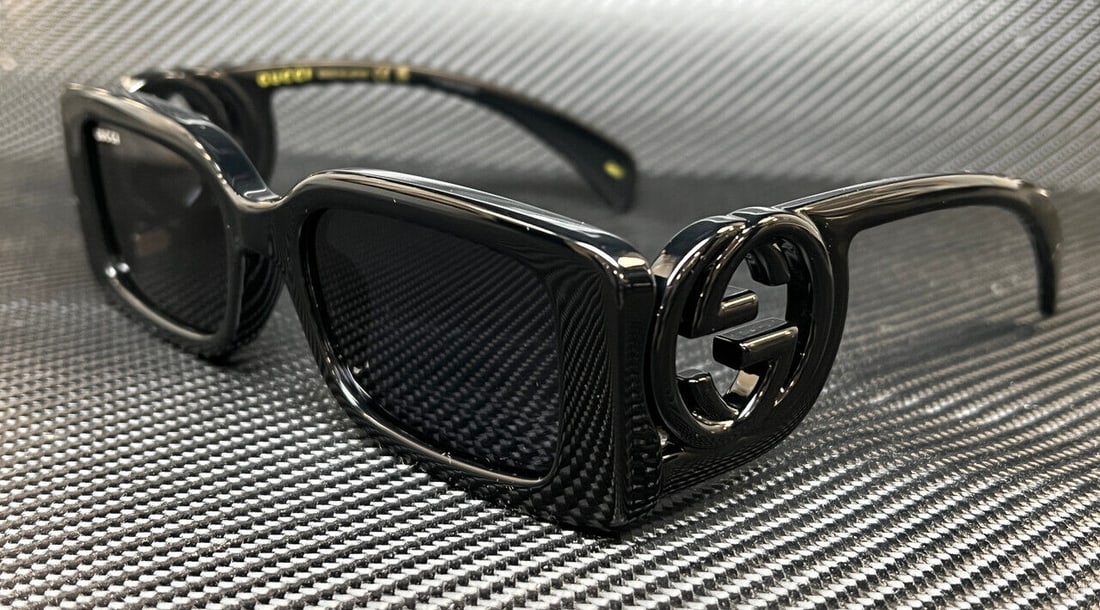 GUCCI GG1325S Black Gray Oversized Square Sunglasses 54mm: GUCCI GG1325S Black Gray Oversized Square Sunglasses 54mm Elevate your style with these GUCCI GG1325S 001 sunglasses designed for women. These oversized sunglasses feature a solid pattern and are perf
