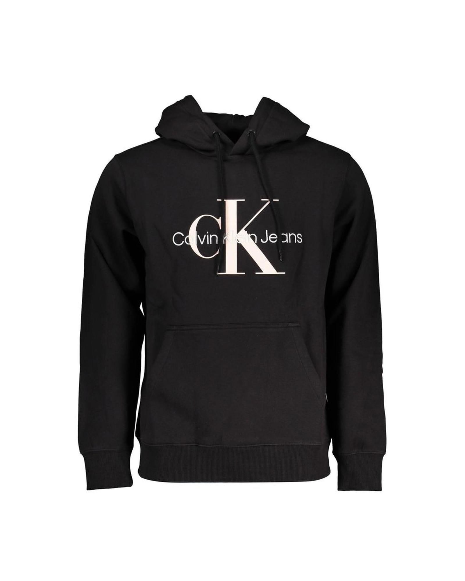 Calvin Klein Calvin Klein Jeans Mens Black Hoodie: Calvin Klein Calvin Klein Jeans Mens Black Hoodie This black cotton sweater is a versatile piece for any mans wardrobe. It features a hood long sleeves and a central pocket. The sweater is made of 100