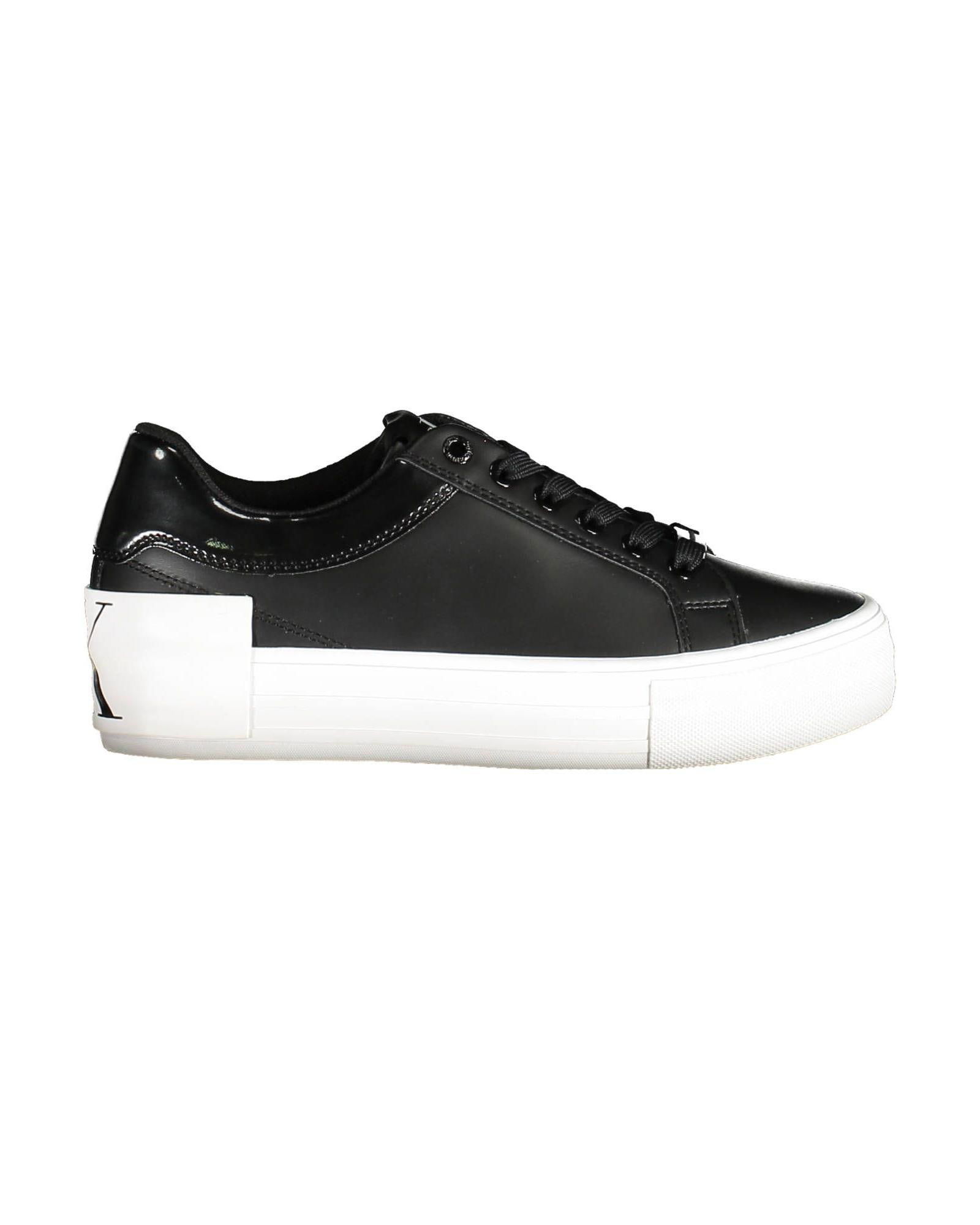 Calvin Klein Calvin Klein Nova Platform Sneaker for Women Black: Calvin Klein Calvin Klein Nova Platform Sneaker for Women Black Black Polyester Sneaker - This sports shoe for women features laces and a 3 cm platform. It is designed with a print application and con