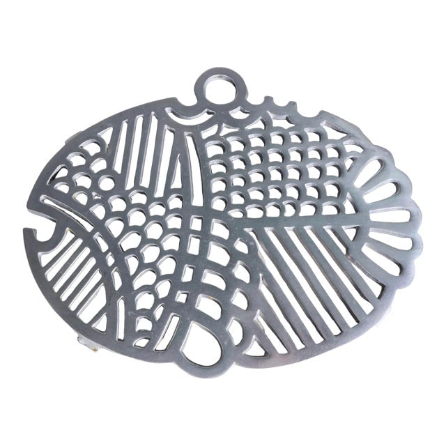 Cast Aluminum Dansk Fish Trivet Made in Taiwan C 1970's: Cast Aluminum Dansk Fish Trivet Made in Taiwan C 1970's Original clean ready to use and or display shows only light cosmetic wear normal and consistent with age. Dimensions: 8"W x 10"D x 0.25"H Styles