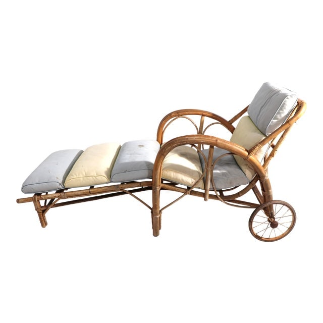 Vintage Bamboo Chaise Lounge: Vintage Bamboo Chaise Lounge Wear to finish loss to handles fabric faded and stained. Dimensions: 31"W x 66"D x 32"H Styles: Art Deco Mid-Century Modern Shabby Chic Seat Height: 13.0 in Arm Height: 25