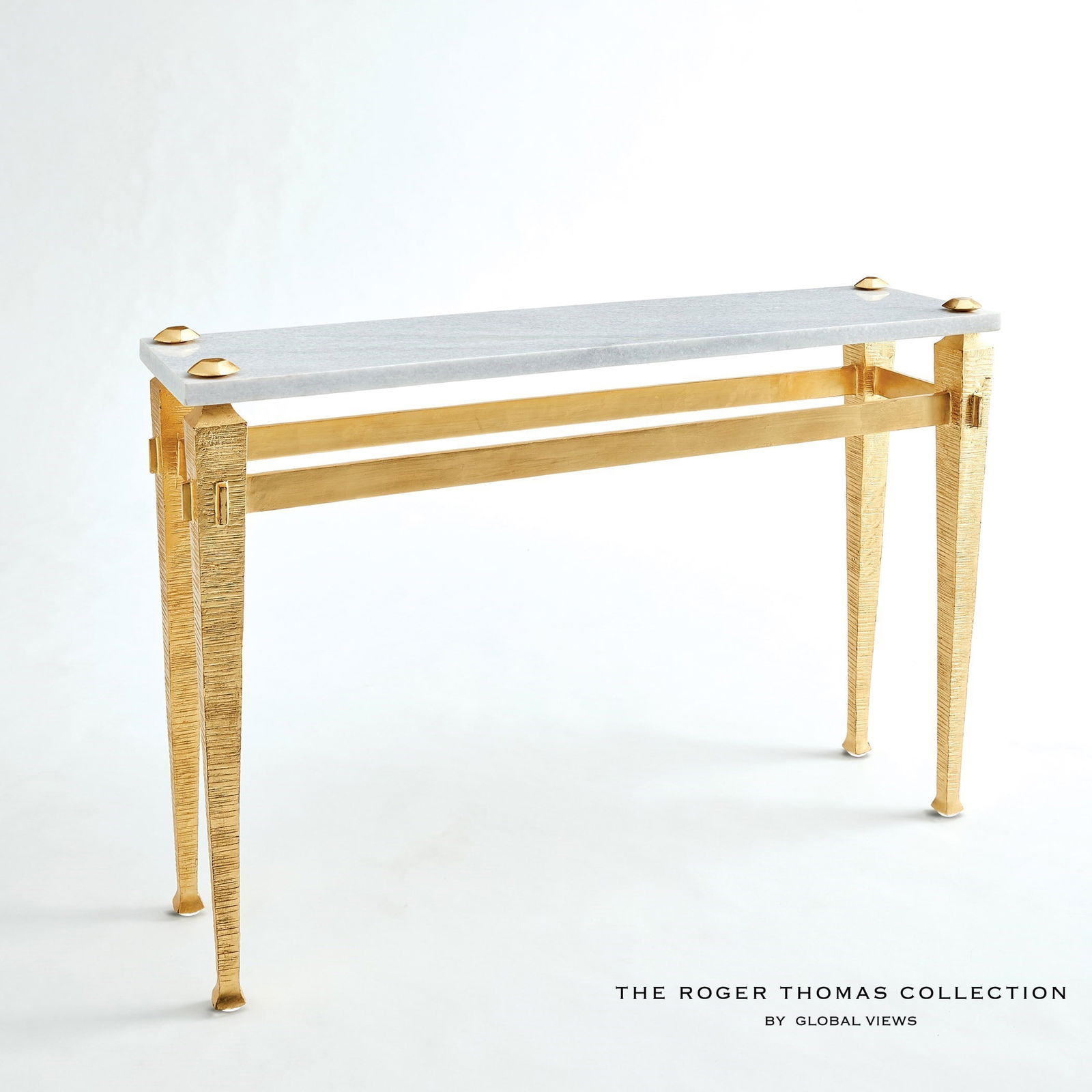 Roman Console In Gold: Roman Console In Gold The Roman collection by Roger Thomas draws inspiration from two notable sources. The silhouette of the leg was inspired by pieces crafted by Thomas Chippendale. The horizontal ch