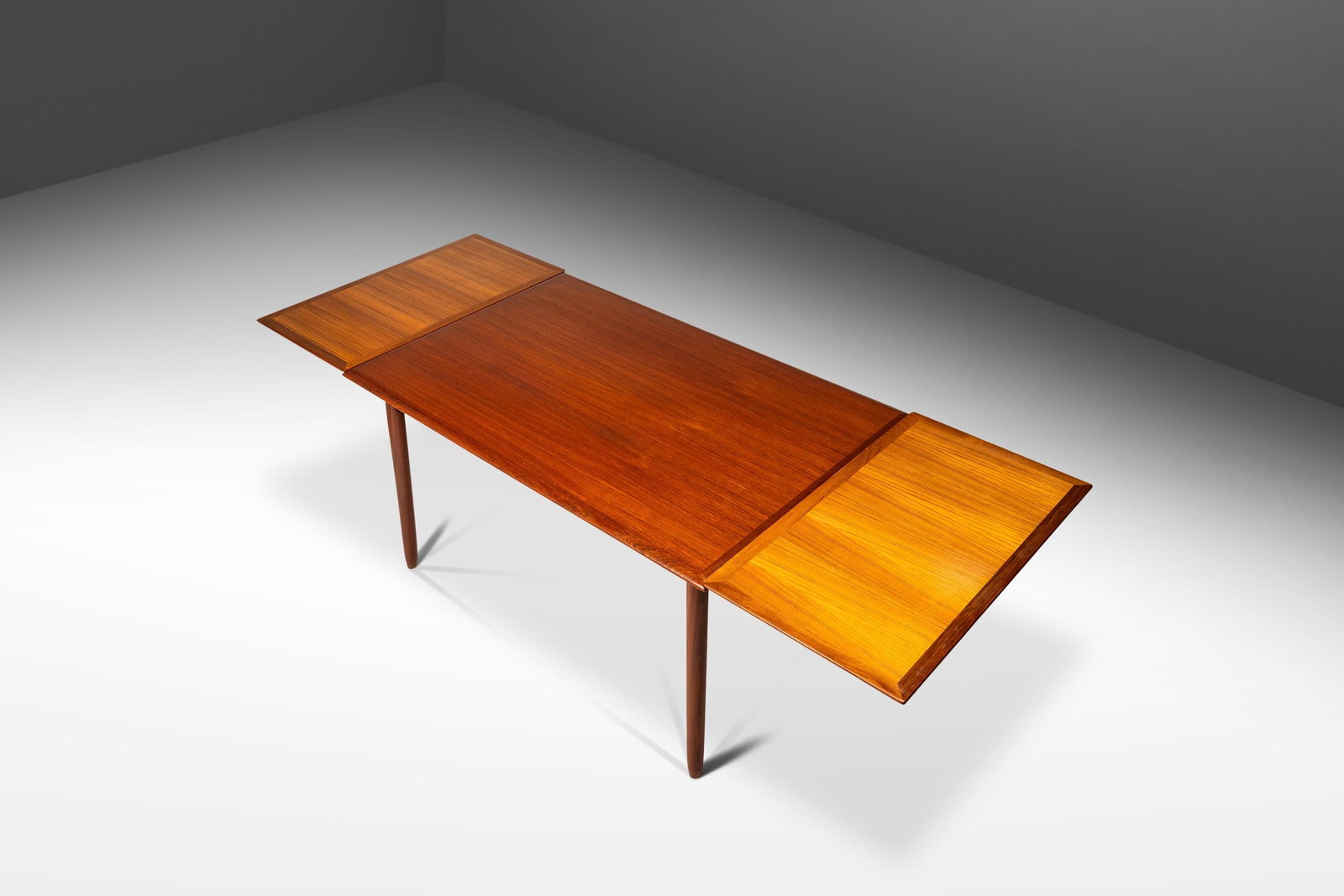 Danish Mid-Century Modern Extension Dining Table in Teak with Stow-in-Table Leaves Denmark c.: Danish Mid-Century Modern Extension Dining Table in Teak with Stow-in-Table Leaves Denmark c. 1960s Danish Mid-Century Modern Extnesion Dining Table in Teak with Stow-in-Table Leaves Denmark c. 1960s 