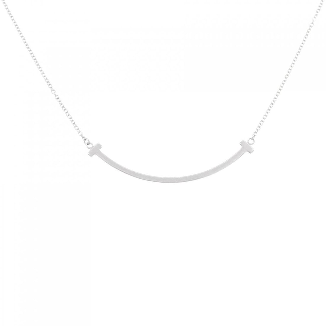 Tiffany T Smile Small Necklace: Tiffany T Smile Small Necklace Style: Necklace Material: 750 White Gold Gender: Ladies" Size: 41 45cm Accessories: No accessories Main Stone: No stones Weight: approx. 3.2g Actualsize: Pendant top H x