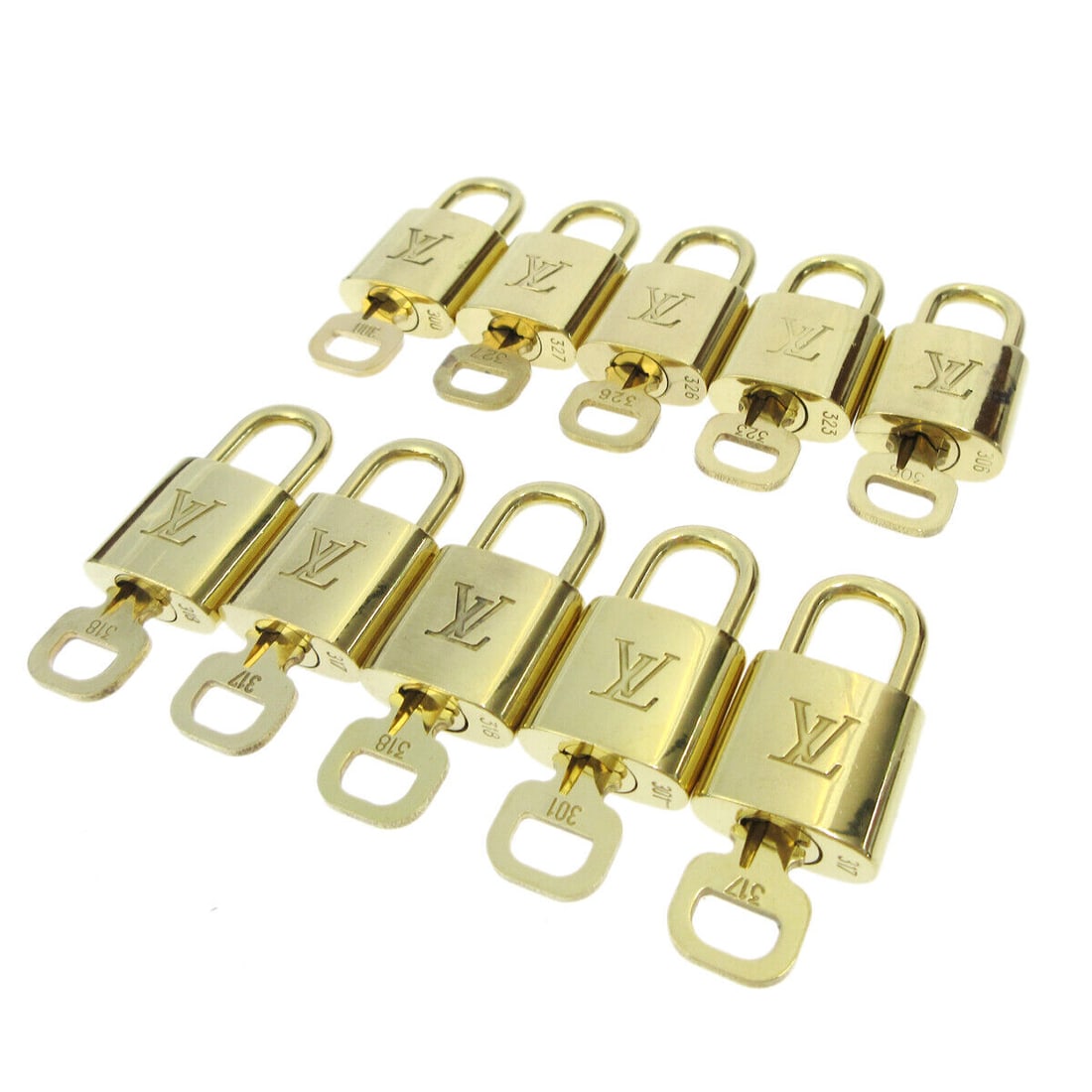 LOUIS VUITTON Padlock & Key Bag Accessories Charm 10 Piece Set Gold: LOUIS VUITTON Padlock & Key Bag Accessories Charm 10 Piece Set Gold Type: Padlock Color: Gold Outside Condition: B: Reasonable Wear and Tear/Inside Condition: C: Heavily Used The BIDHAUS Guarantee: Al