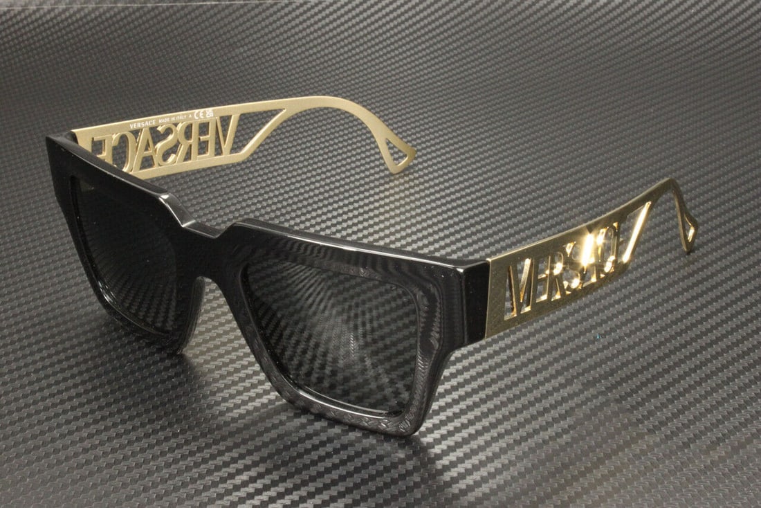 VERSACE VE4431F GB1 87 Black Dark Grey Women's 50 mm Sunglasses: VERSACE VE4431F GB1 87 Black Dark Grey Women's 50 mm Sunglasses Frame Color: Black New The BIDHAUS Guarantee: All items in this auction are guaranteed to be 100% authentic. At Your Service: At BIDHAUS