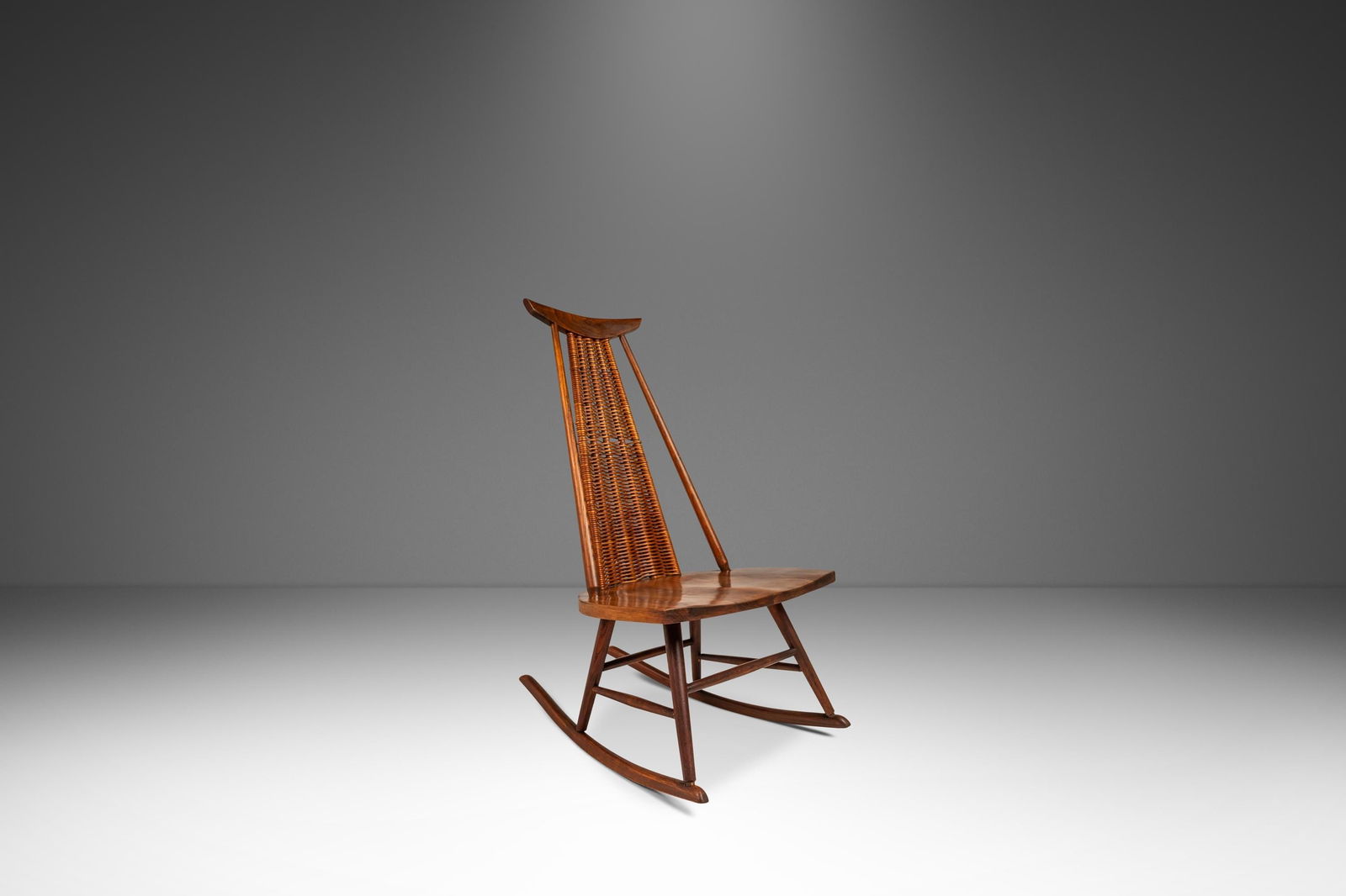 Mid-Century Modern Rocking Chair in Solid Walnut & Rattan by Arthur Umanoff for Washington Woodcraft: Mid-Century Modern Rocking Chair in Solid Walnut & Rattan by Arthur Umanoff for Washington Woodcraft USA c. 1960's Mid-Century Modern Rocking Chair in Solid Walnut & Rattan by Arthur Umanoff for Washi