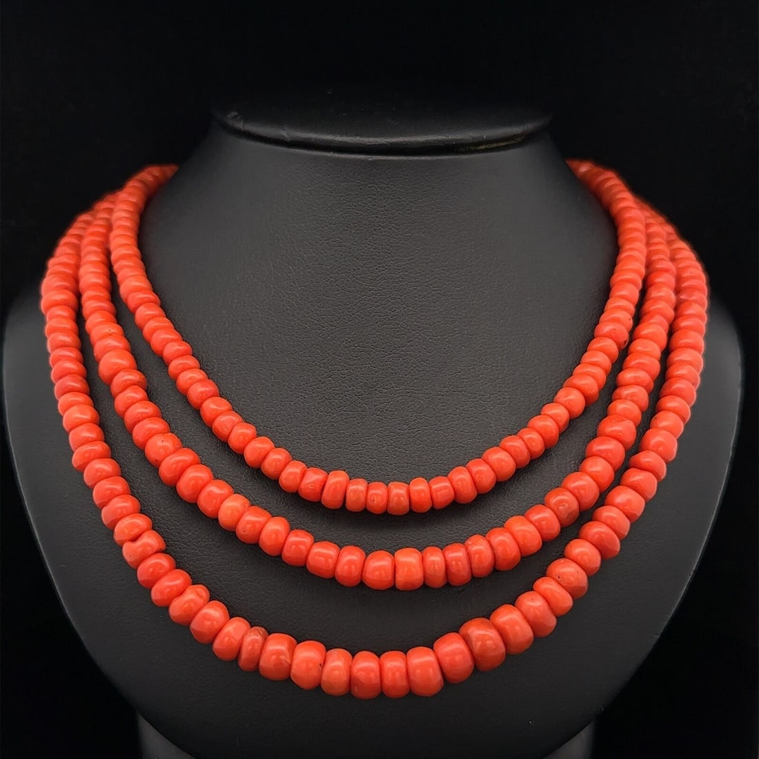 Vintage GIA Certified 3 Strand Coral Necklace with 14k Yellow Gold Clasp: Vintage GIA Certified 3 Strand Coral Necklace with 14k Yellow Gold Clasp This vintage GIA 3 Strand Rondelle Beads Coral Necklace features numerous natural genuine corals in a rondelle bead shape, show