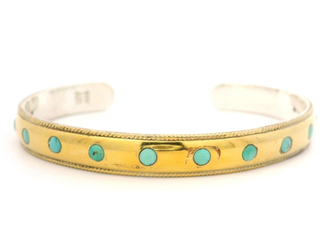 Anna Beck Sterling Silver Gold Plated Turquoise Cuff Bracelet 6.75 Inches: Anna Beck Sterling Silver Gold Plated Turquoise Cuff Bracelet 6.75 Inches This Anna Beck Silver & Gold Plated Inlaid Cabochon Turquoise Open Cuff Bracelet features a stylish cuff design, adorned with 