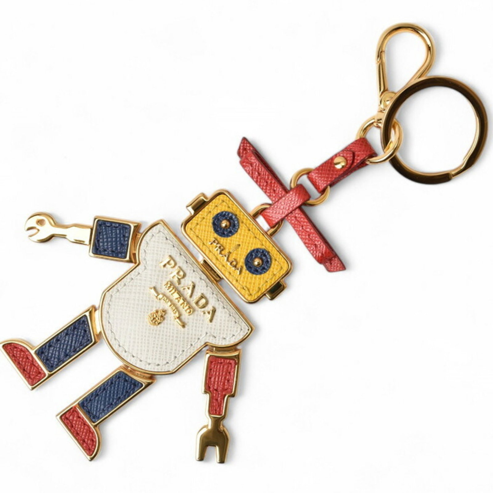 Prada Trick Robot Key Ring Holder Red Leather Gold Tone 3.54in: Prada Trick Robot Key Ring Holder Red Leather Gold Tone 3.54in Brand: Prada. Type: Keyring. Gender: Women. Color: Gold Red color. Material: Leather Metal. Size (HxWxD): 9cm x 9cm / 3.54 x 3.54. Condit