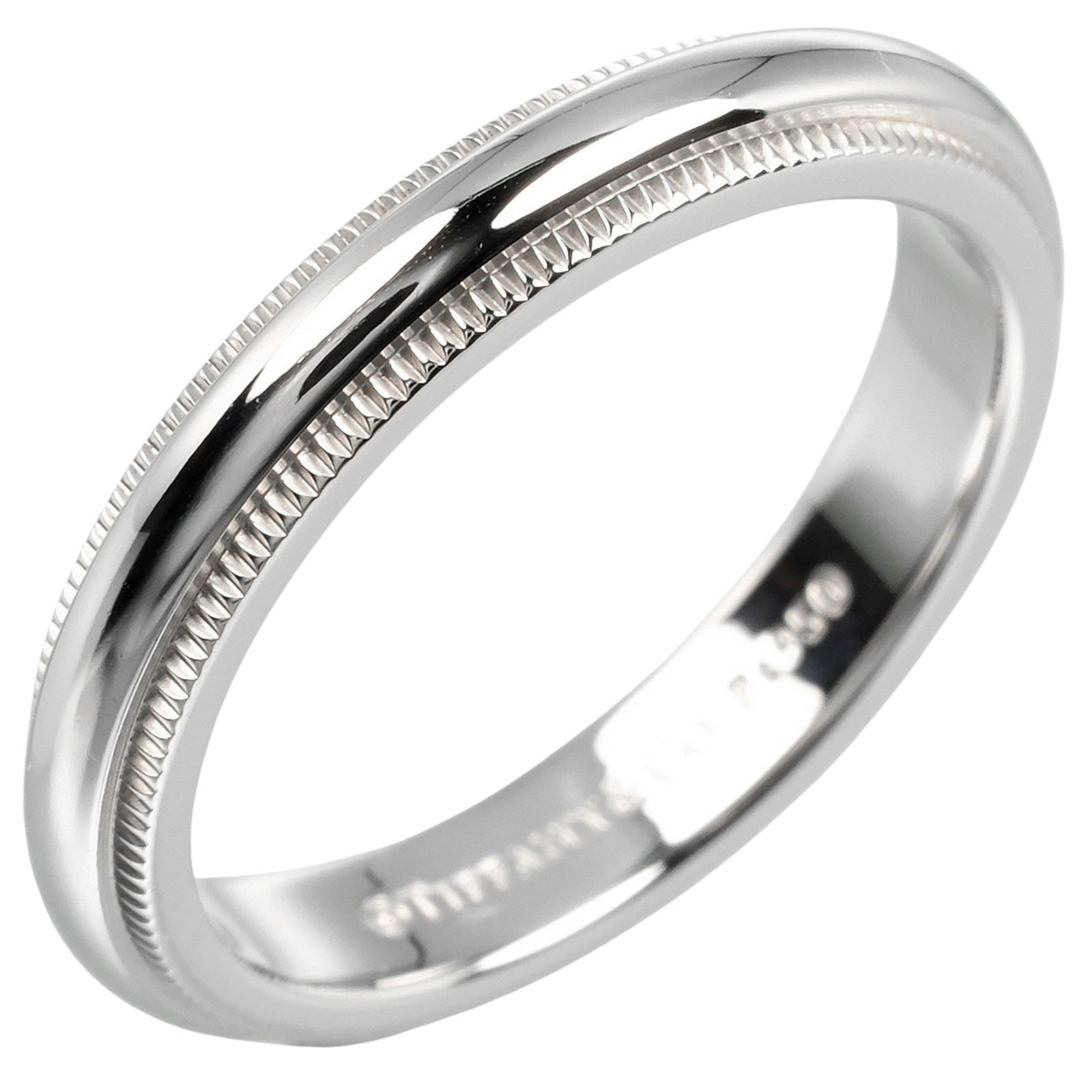 Tiffany & Co. Together Milgrain Band Ring Pt950 Platinum Size 8.5: Tiffany & Co. Together Milgrain Band Ring Pt950 Platinum Size 8.5 This Tiffany & Co. Together Milgrain Ring features a delicate band design in Pt950 Platinum, weighing approximately 5.33g. It is a wom