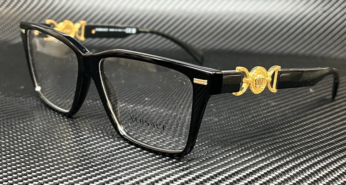 VERSACE VE3335 Black Gold Women's 56mm Eyeglasses: VERSACE VE3335 Black Gold Women's 56mm Eyeglasses These VERSACE VE3335 GB1 eyeglasses feature a sleek black frame, designed specifically for women. Ideal for adding a touch of elegance to any outfit,