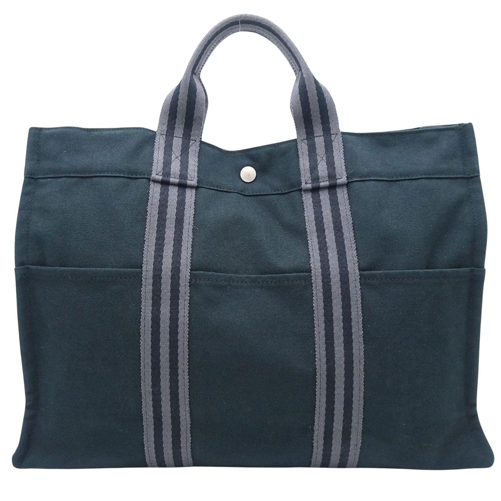 Hermes Fourre Tout Navy Canvas Tote Bag 31cm x 43cm: Hermes Fourre Tout Navy Canvas Tote Bag 31cm x 43cm The Hermes Fourre tout is a stylish and functional tote bag made from durable canvas. This versatile accessory features comfortable cotton handles f