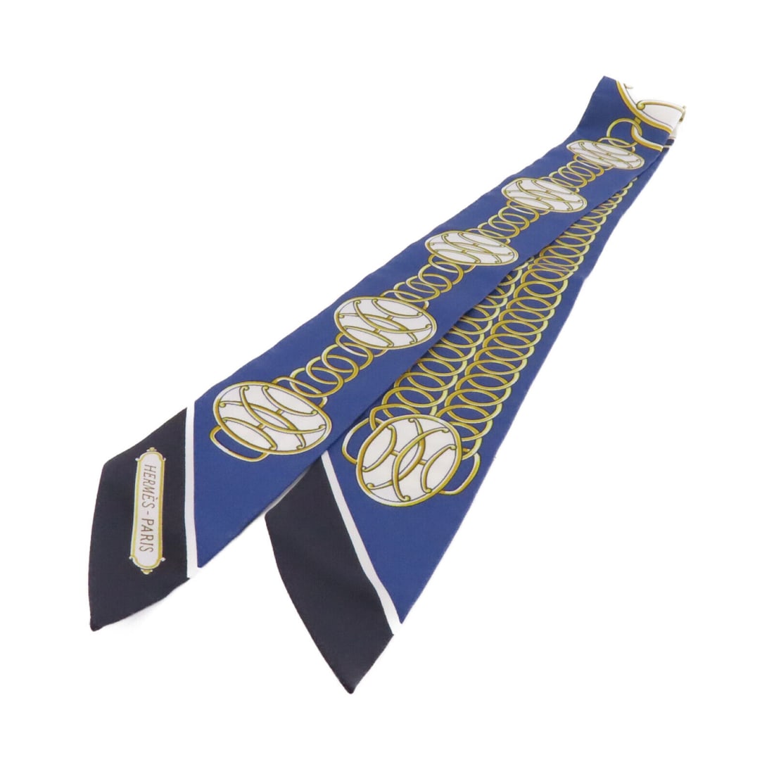 HERMES Silk Twilly Scarf Blue White Regular Size: HERMES Silk Twilly Scarf Blue White Regular Size This elegant HERMES Twilly Scarf is crafted from high-quality silk, featuring a sophisticated blue and white color palette. Designed as a regular size