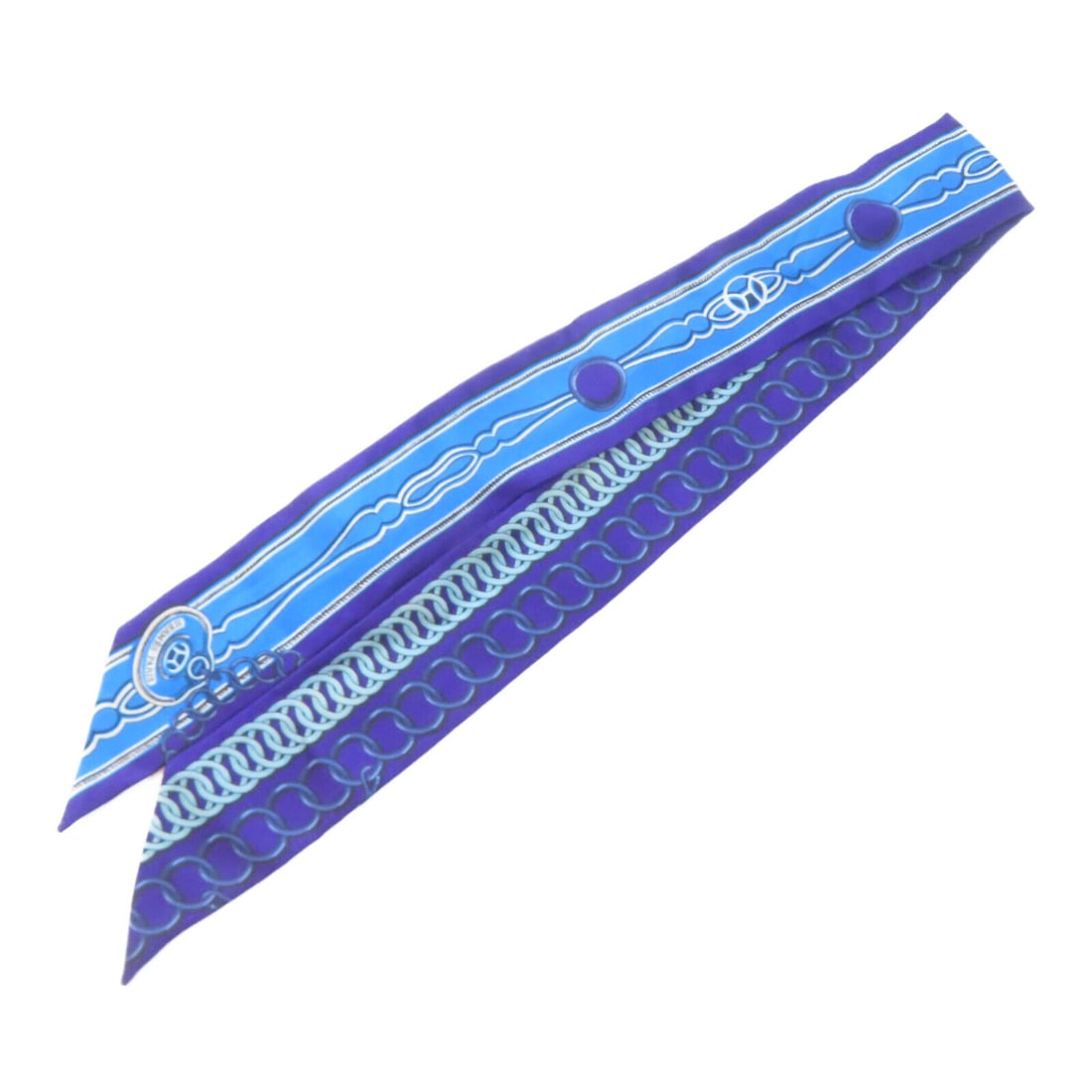 HERMES Twilly Silk Scarf in Blue Elegant Accessory: HERMES Twilly Silk Scarf in Blue Elegant Accessory Elevate your accessory collection with this HERMES Twilly Scarf. This elegant scarf is crafted from luxurious silk, showcasing a beautiful blue color