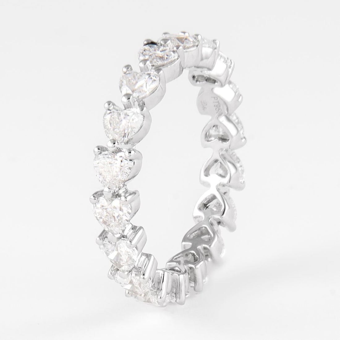 2.51 Carat Heart Cut Diamond Platinum Eternity Band Size 6.25: 2.51 Carat Heart Cut Diamond Platinum Eternity Band Size 6.25 This exquisite eternity band features a stunning heart cut diamond weighing 2.51 ct, set in luxurious platinum. The ring is a size 6.25 US