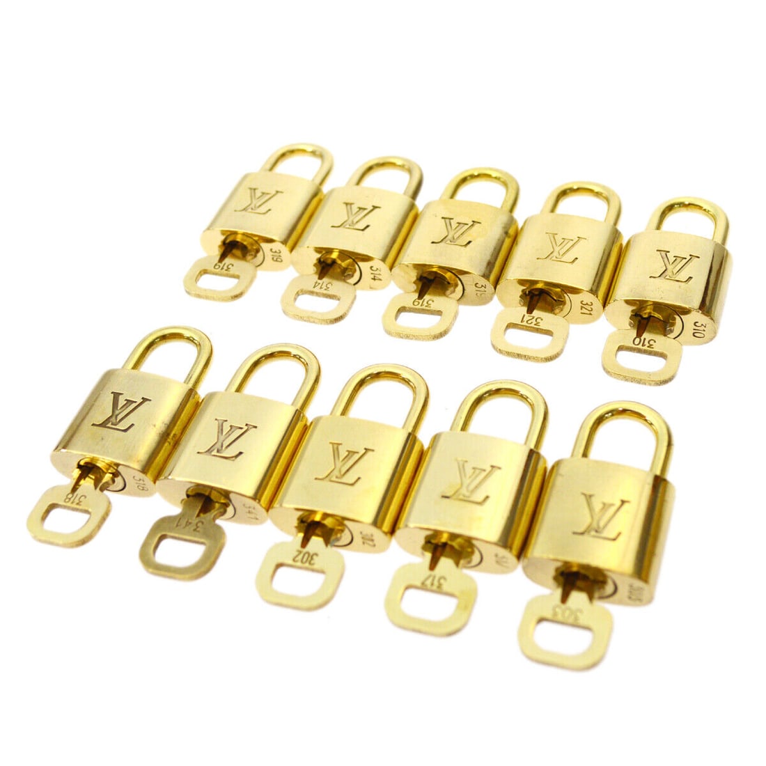 LOUIS VUITTON Gold Padlock and Key Charm Set 10 Pieces: LOUIS VUITTON Gold Padlock and Key Charm Set 10 Pieces This listing features a LOUIS VUITTON Padlock & Key Bag Accessories Charm Set consisting of 10 pieces in gold color. The padlocks display reasona