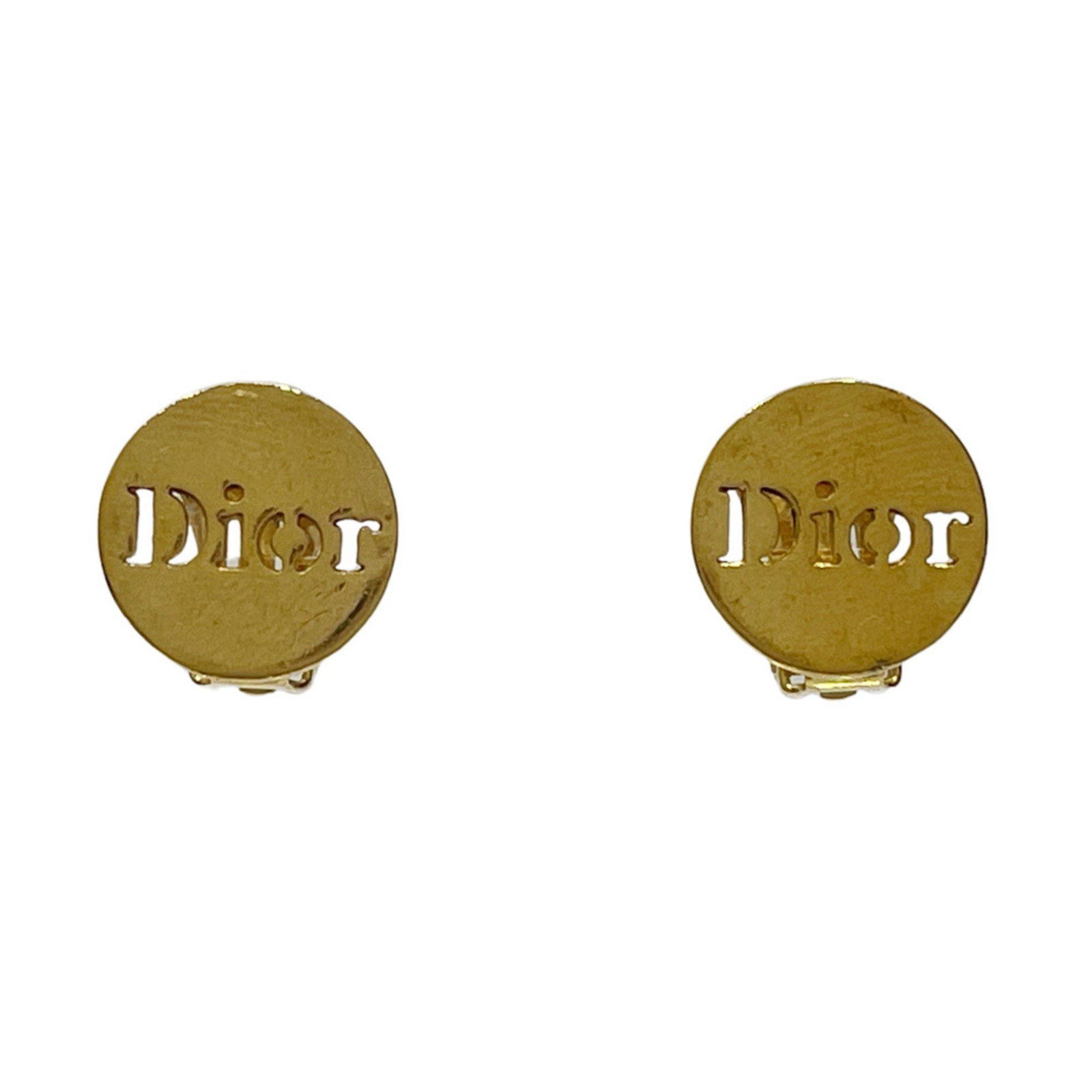 Vintage Christian Dior Gold Plated Clip Earrings Round Logo: Vintage Christian Dior Gold Plated Clip Earrings Round Logo These vintage clip earrings by Christian Dior feature a stylish round design and are beautifully crafted with a gold plated finish. Designed