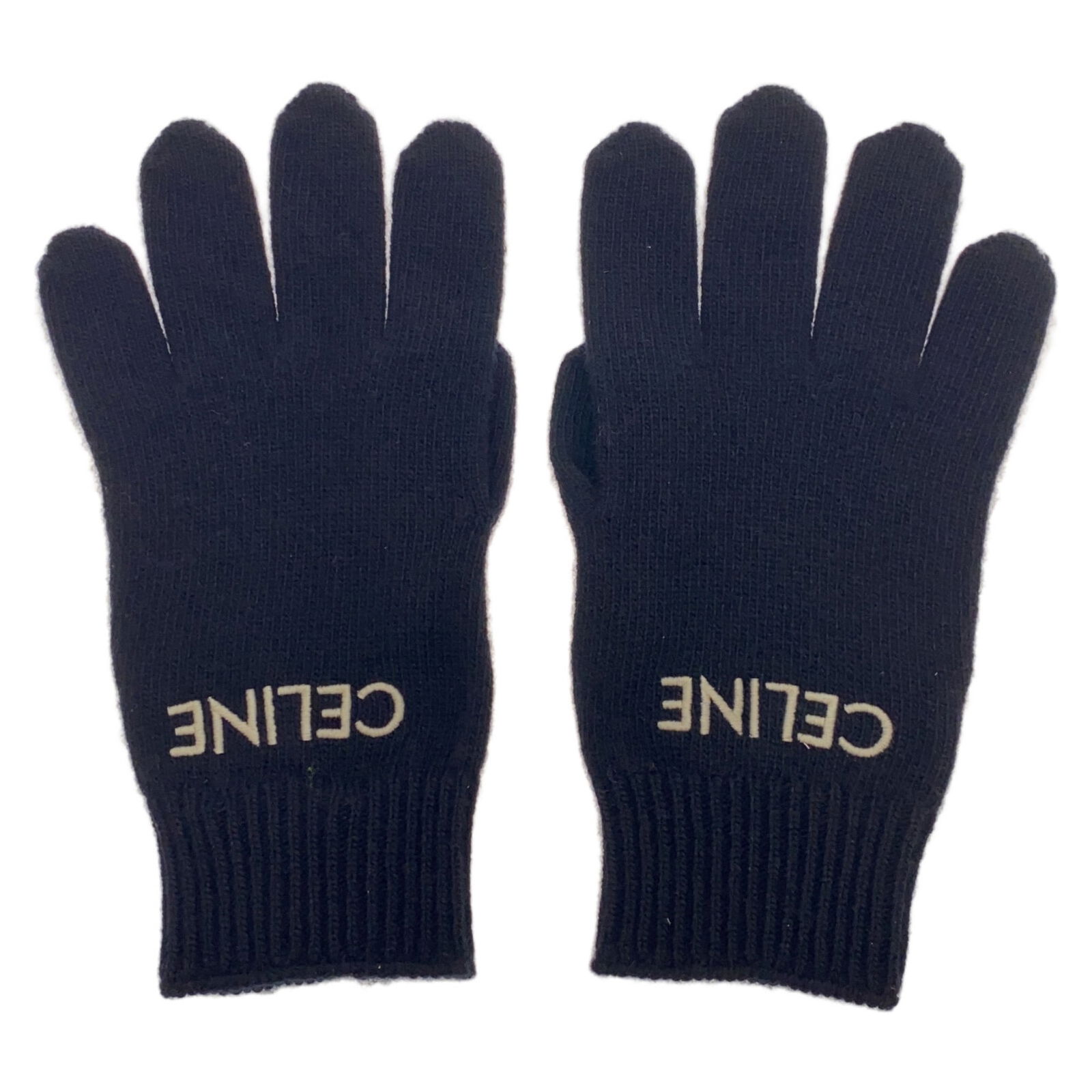 Celine Unisex Black Wool Gloves 26cm x 11cm: Celine Unisex Black Wool Gloves 26cm x 11cm Introducing a pair of warm gloves by Celine, crafted in France. These gloves are made from high-quality wool and come in a classic black color. Designed for