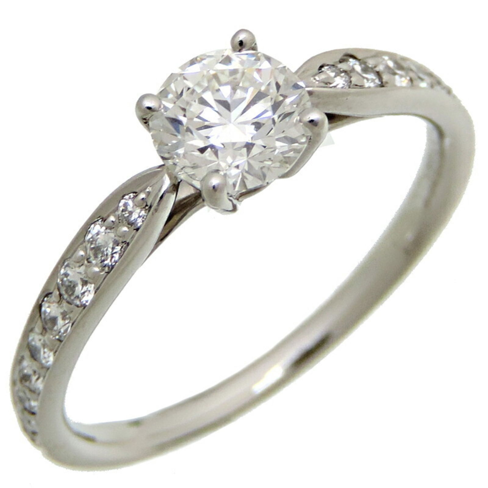 Tiffany Harmony 0.56ct IF Diamond Band Ring Silver 925: Tiffany Harmony 0.56ct IF Diamond Band Ring Silver 925 Size (Non US) 10 This Tiffany Harmony Round Brilliant Engagement Ring features a stunning 0.56ct diamond with an IF clarity, set in a beautiful b