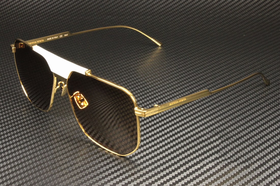 Bottega Veneta BV1036S Gold Rectangle Sunglasses 60mm for Men: Bottega Veneta BV1036S Gold Rectangle Sunglasses 60mm for Men These BOTTEGA VENETA BV1036S 006 sunglasses feature a stylish rectangle design, perfect for men. The frame is elegantly crafted in gold, a