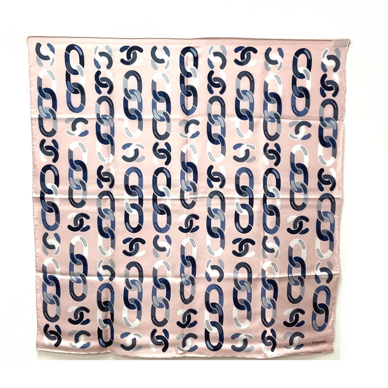 Chanel Pink Silk Square Carre Scarf with CC Coco Mark 90cm: Chanel Pink Silk Square Carre Scarf with CC Coco Mark 90cm This CHANEL CC Coco Mark Chain Motif Carre Scarf is a luxurious accessory designed for women. It features a beautiful pink color and is made
